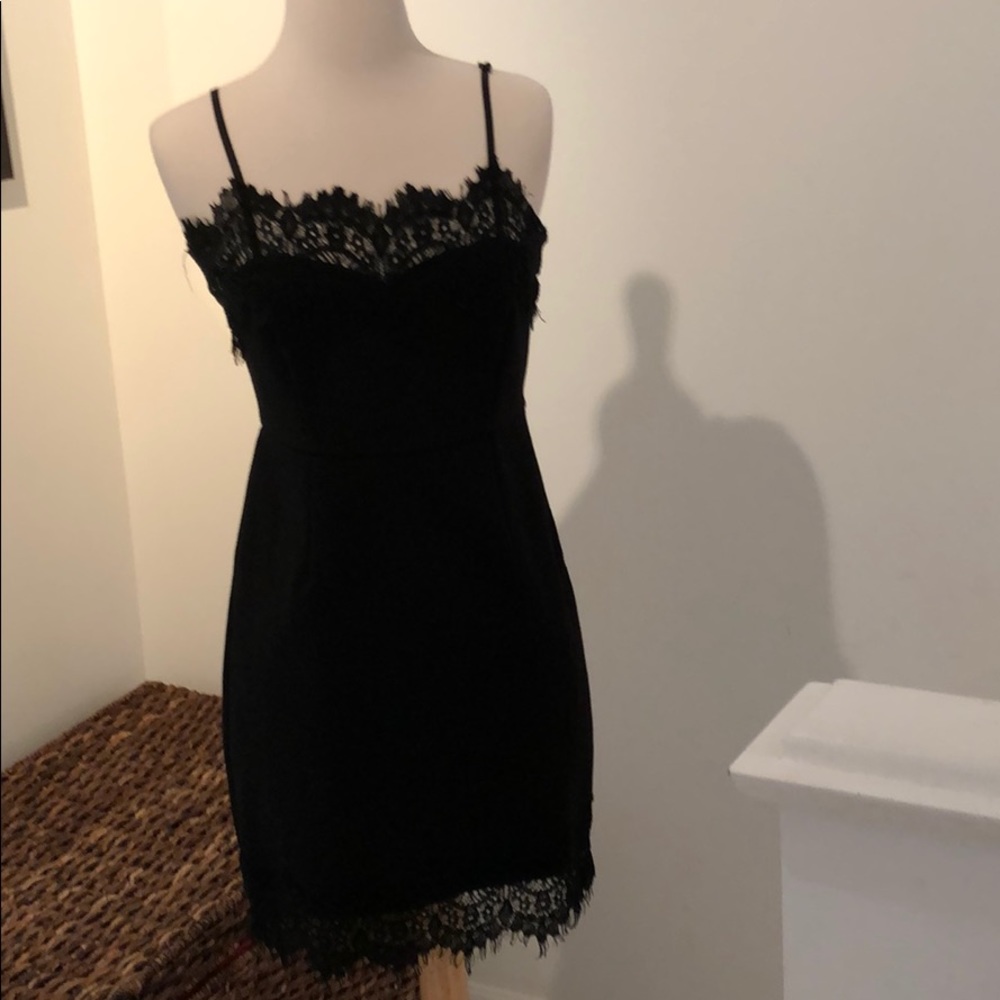 Stretch gabardine sheath with lace slip top.